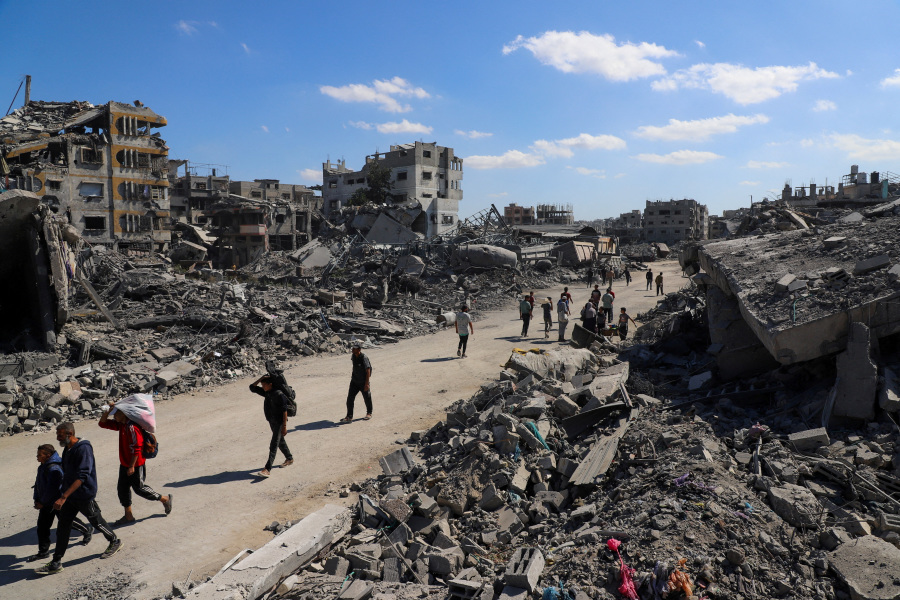 Hamas hands over hostage bodies after Israel threatens aid cut