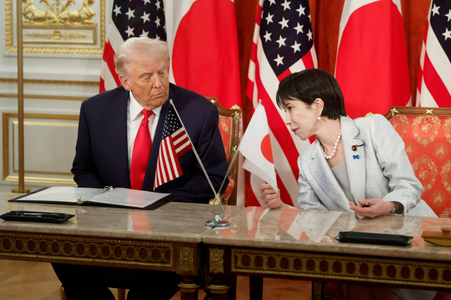 Trump urged Japan PM to avoid escalation in China dispute, sources say