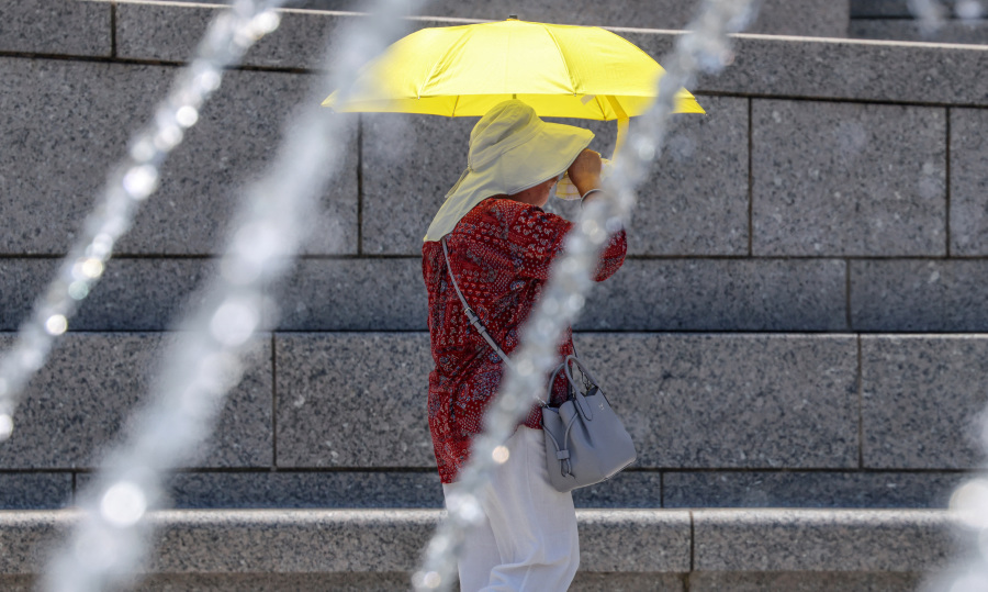 US cities face record high temperatures on worst day of heat wave