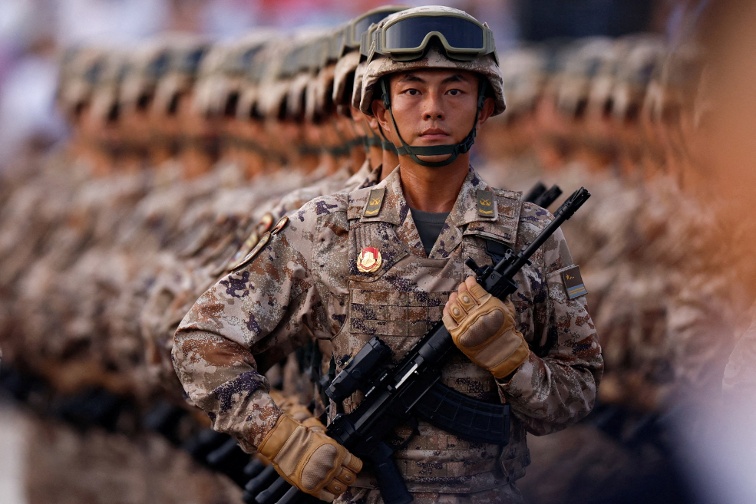 Japan refutes  new militarism , accuses China of rapidly arming