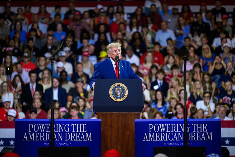 Trump touts tax policy, tariffs at Michigan rally