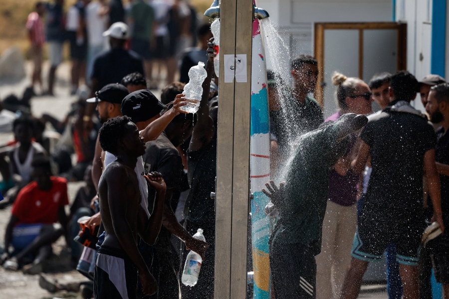 Migrants say hunger and hostility drove them back from Spain s Ceuta to Morocco
