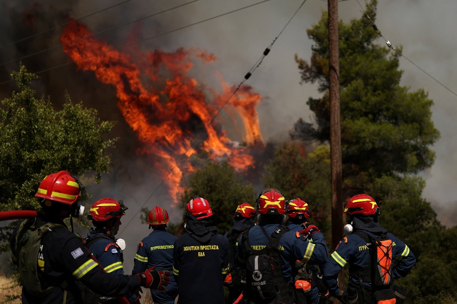 Greece battles wildfires, Hungary shuts nuclear power plant due to drought