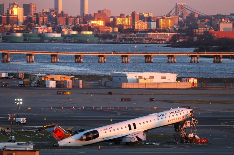 FAA moves to fire two controllers who left work before fatal LaGuardia collision, source says