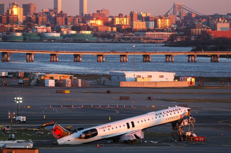 FAA moves to fire two controllers who left work before fatal LaGuardia collision, source says