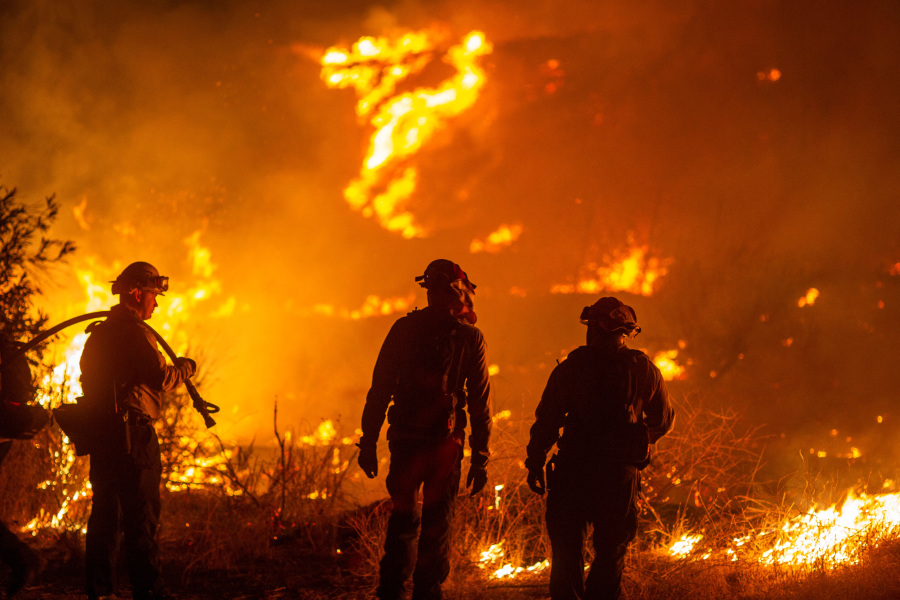 Massive new Los Angeles-area fire balloons as winds pick up