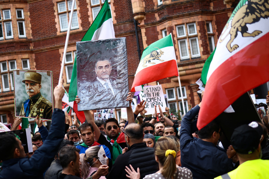 Iran s divided opposition senses its moment but activists remain wary of protests