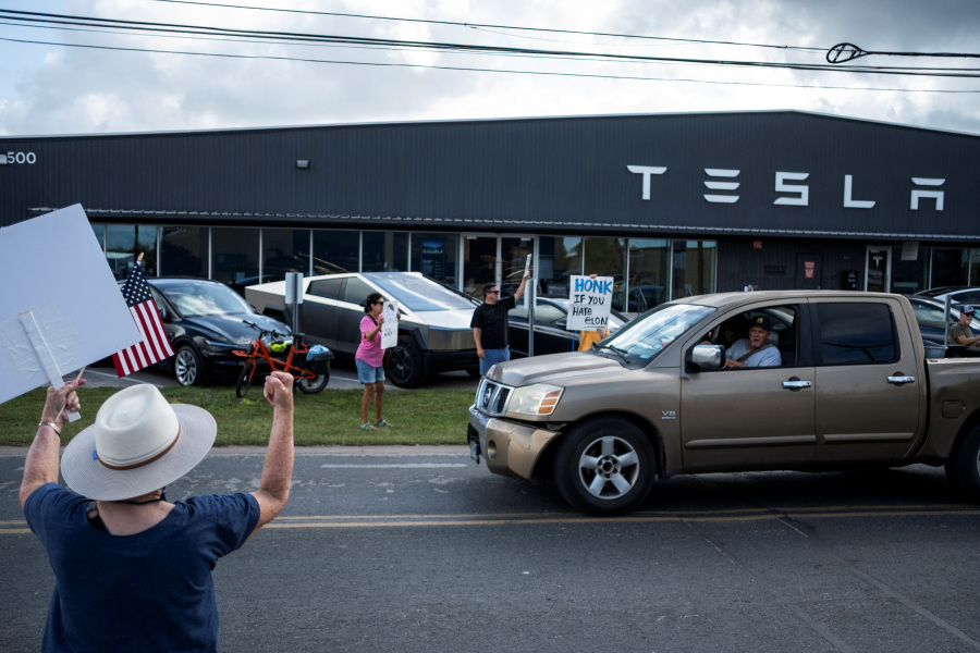 Tesla tiptoes into long-promised robotaxi service