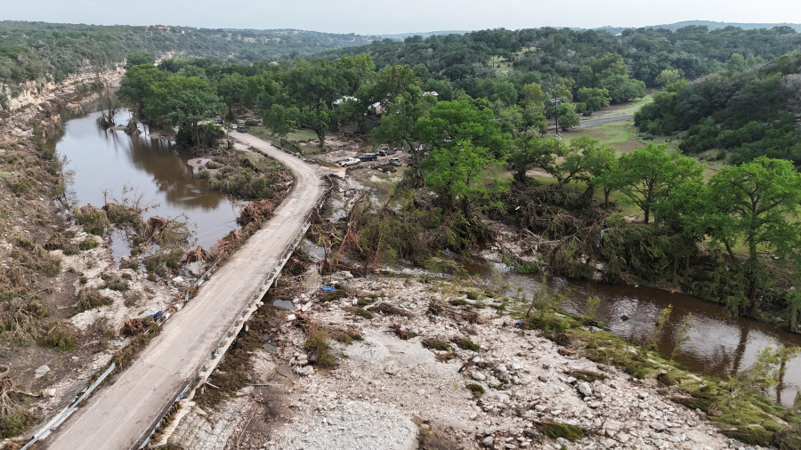 Witness recalls furniture, trees and RVs swept down river