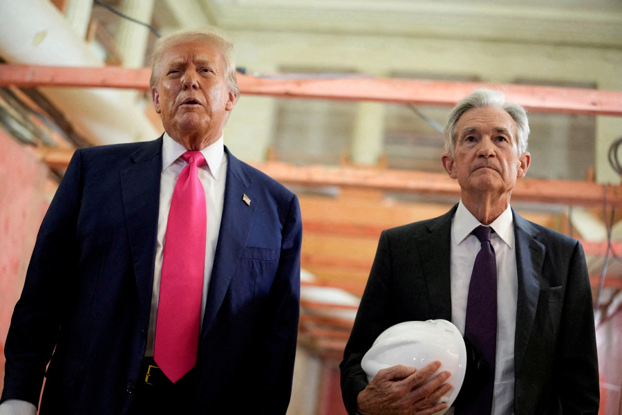 Powell, citing jobs risk, opens door to cuts but doesn t commit