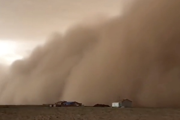 Sandstorm Affects Nearly Half of China, Rare  Blue Sun  Observed in Beijing
