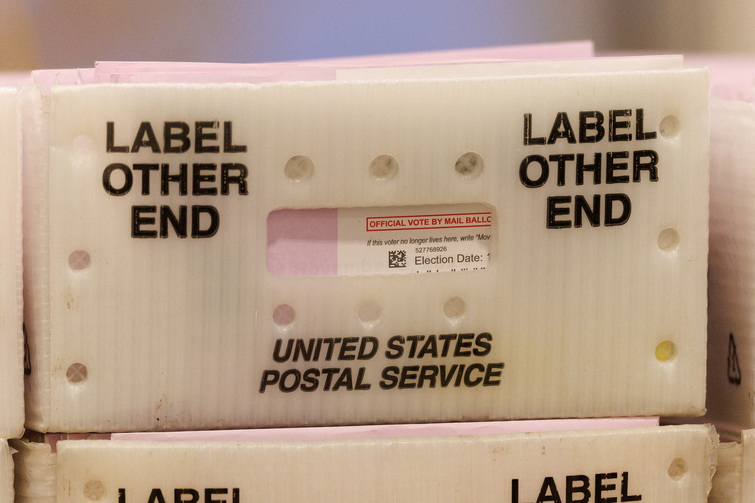 Trump votes by mail as he dubs mail-in voting  cheating 