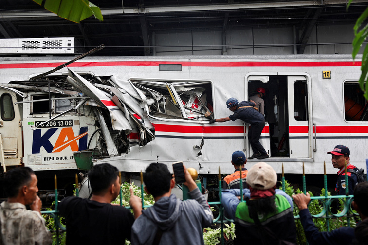 Indonesia train crash toll rises to 14 as rescuers work to remove trapped passengers