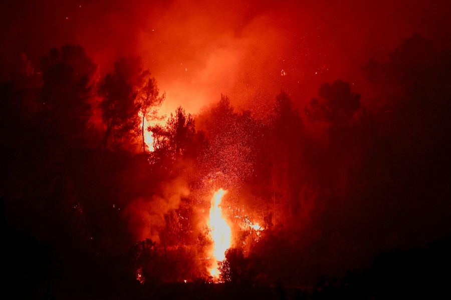 Wildfires rage in Greece as firefighters continue battle in France and Spain