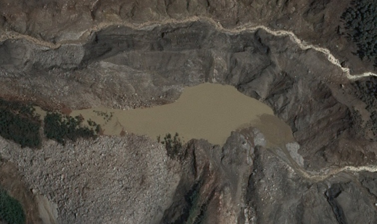 Nepal monitoring two lakes, flood risk to remain until they re fully drained, official says