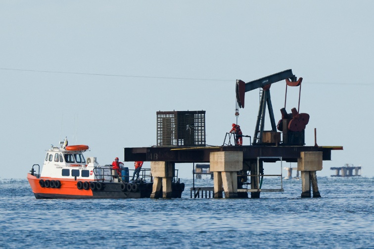 US oil firm to take over some Venezuelan oilfields previously run by Chinese, Russian companies, officials say