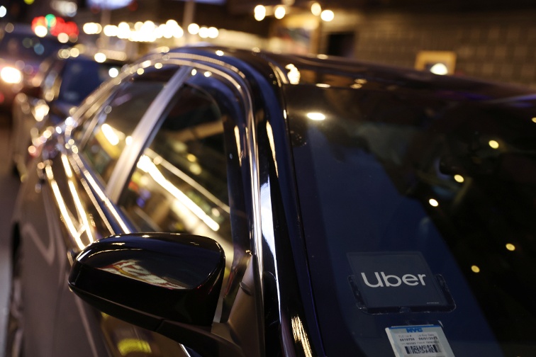 Uber doubles down on robotaxi plans, shares fall on weak profit forecast